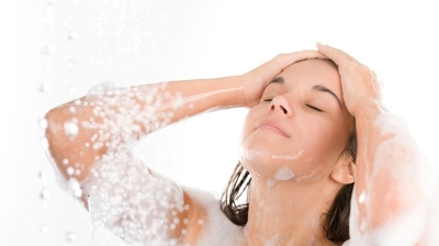 l592wktbx9j.2406251339550 A woman is taking a shower.