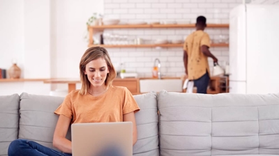 c9toyla38dp.2406251339550 a woman in living room & a man in the kitchen