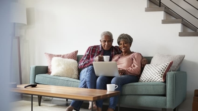 Air Cleaner Vs. Humidifier – Which Do I Need? Man vs woman watching laptop