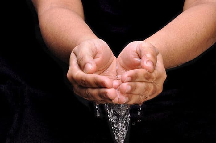 hands cupping water