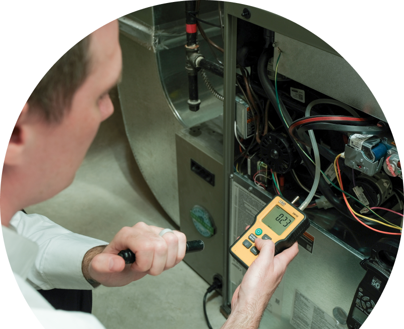 Knight HVAC specialist performing furnace repair on a heating sy