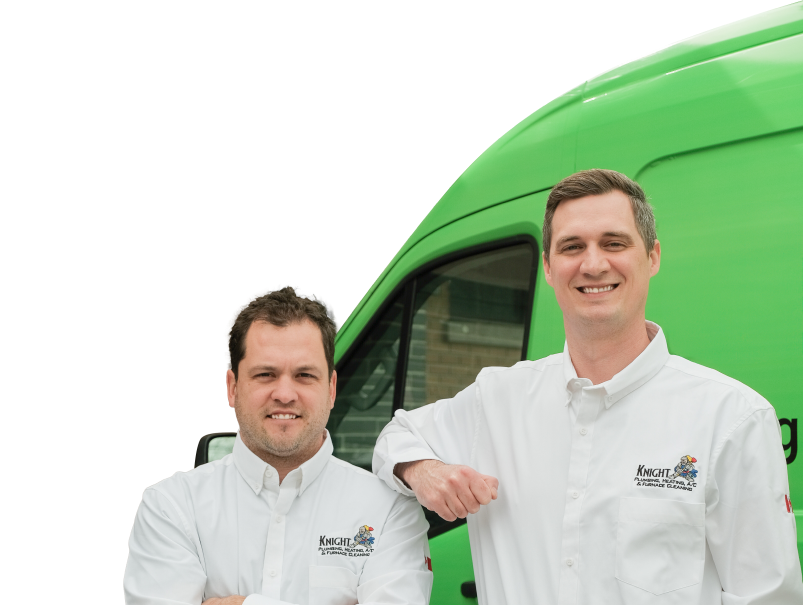 Two Knight Plumbing technicians smiling in front of their green service van, wearing issued jackets during an on-site consultation. Two Knight Plumbing technicians smiling in front of their green service van, wearing issued jackets during an on-site consultation.