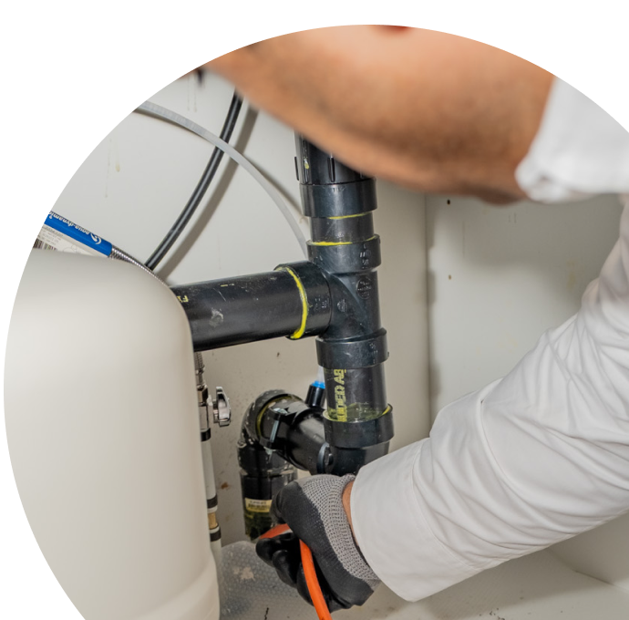 A Knight plumbing specialist uses a hydro jet to clear a clogged drain. A Knight plumbing specialist uses a hydro jet to clear a clogged drain.