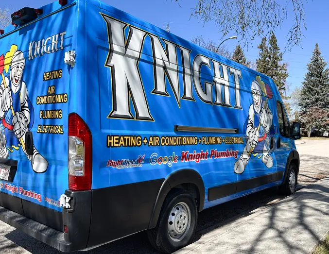Knight Plumbing service van with HVAC, plumbing, and electrical branding parked in a suburban neighborhood, promoting local trust. Knight Plumbing service van with HVAC, plumbing, and electrical branding parked in a suburban neighborhood, promoting local trust.